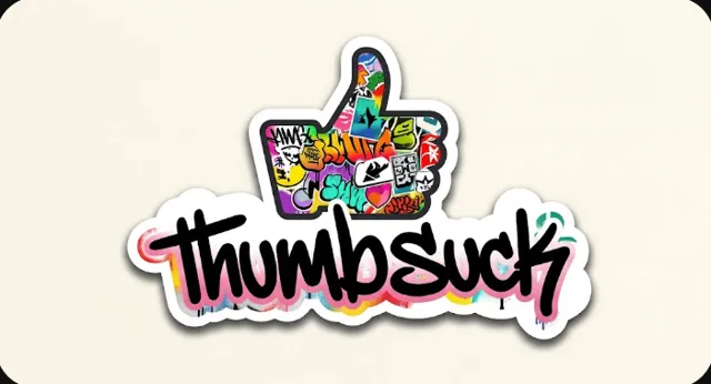 Thumbsuck: a sticker-bombed thumbs-up above the graffiti wordmark